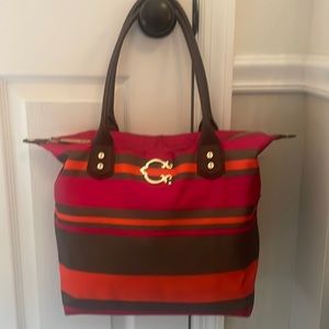 C Wonder tote with zipper closure.  Lined inside pocket. Clean minimal wear